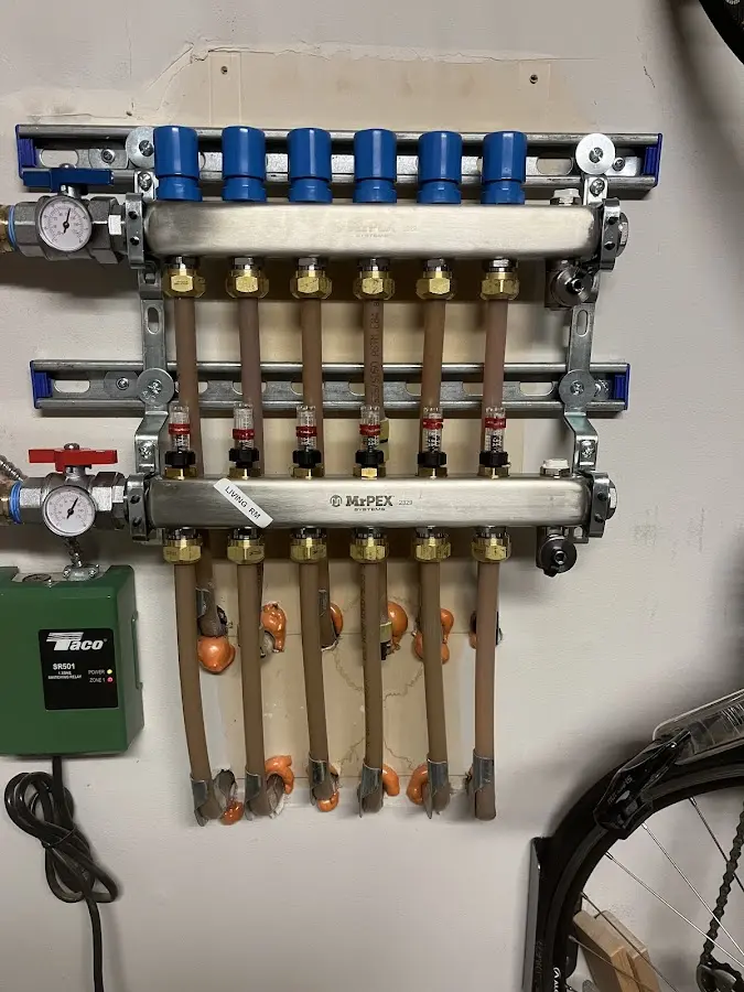 Plumber performing Leak Detection at a residential property in Scottdale